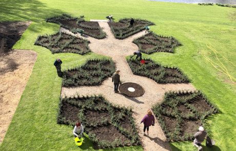 The-Essex-Garden-Co-garden-Maintenance-aerial Aerial shot of the garden maintenance team planting new flowers.